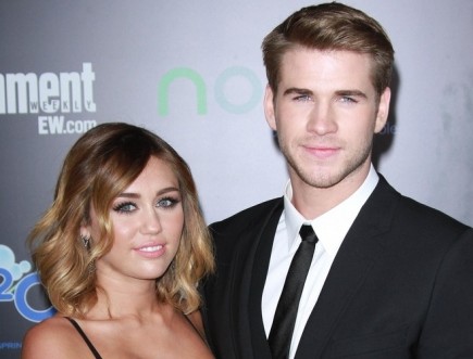 Miley Cyrus and Liam Hemsworth. Photo: Andrew Evans / PR Photos