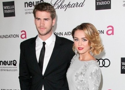 Liam Hemsworth and Miley Cyrus. Photo: Andrew Evans / PR Photos
