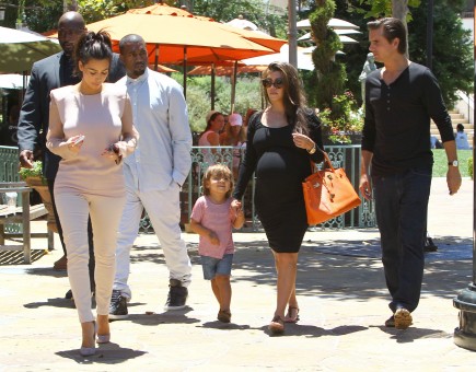 Kim Kardashian, Kanye West, Kourtney Kardashian and Scott Disick. Photo: FAMEFLYNET